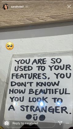 a sign that says you are so used to your features, you don't know how beautiful you look to a strange person