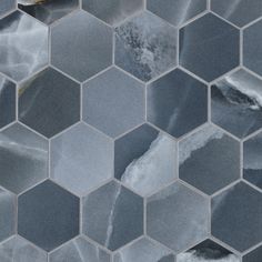 an abstract tile design with hexagonal tiles in grey and white colors, including marble