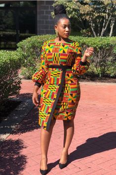 Ohema sweetie's kente dress.This  outfit is a female African dress. it comes with some touches of carefully and beautifully designed embroidery.  It is a hand crafted Afro-chic dashiki. It comes in various sizes which you select from the size chart when placing your order. I accept custom measurements to process your orders for you if you want. So it is a custom made piece for you to show off in.  If you have any questions whatsoever, please feel free to contact me and i will gladly help. I am a Corporate Wears, Kitenge Designs, Kente Print, Kente Dress, Ankara Dress Styles, Short African Dresses, Afrikaanse Mode, Gaun Fashion, African Fashion Modern