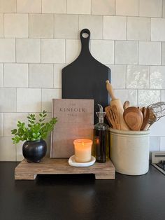 the kitchen counter is clean and ready to be used as a candle holder for cooking utensils