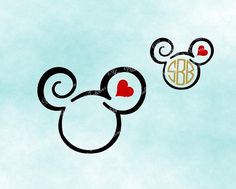 two mickey mouse heads with monogrammed hearts and the letter b on each side