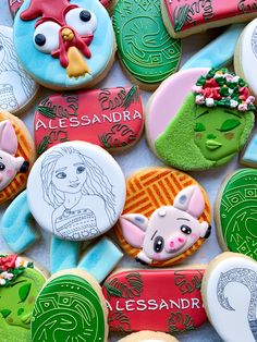 decorated cookies are displayed on a table