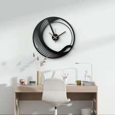 a white chair sitting in front of a desk with a black clock on the wall