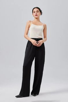 Effortlessly Chic, Uncompromising Comfort Embrace modern elegance with these high-waisted, wide leg silk pants. Featuring luxurious mulberry silk, these pants offer a sophisticated flow with voluminous pleats that provide a layered texture. The tailored waistband with a matching sash ensures a comfortable fit without compromising on style. Style #: WWAJ012 Luxury Wide-leg Relaxed Fit Pants, Sleek Silk Wide-leg Pants, Wide Leg Silk Pants, Luxury Silk Wide Leg Ankle-length Pants, Silk Wide-leg Bottoms With Elastic Waistband, Black Silk Wide-leg Pants, Silk Pants, Leg Design, Mulberry Silk