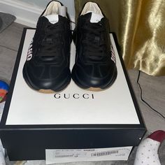 Men’s Rython Gucci Band Sneakers Black In A Size 4 1/2 = Us Size 5. These Sneakers Are Brand New. Gucci Leather Sneakers With Contrast Sole, Gucci Lace-up Calf Leather Sneakers, Gucci Casual Calf Leather Sneakers, Designer Black Sneakers With Logo Print, Sporty Gucci Leather Custom Sneakers, Casual Gucci Calf Leather Sneakers, Designer Black Custom Sneakers With Logo Print, Gucci Leather Sneakers, Gucci Designer Calf Leather Sneakers