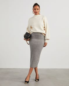 A seasonal fave, the Marciana Knit Midi Skirt is composed of thick, stretchy ribbed knit with an elastic waistband. It accentuates a body-hugging silhouette and hits just below the knee – perfect for showing off boots and heels. Elastic waistband Midi length Thick, stretchy ribbed knit No closures or lining 39% Polyester 18% Acrylic 12% Polyester 11% Wool 10% Rayon 5% Polyester 5% Nylon Gray Knitted Skirt Outfit, Green Knit Skirt Outfit, Casual Maxi Skirt Outfits, Knit Midi Skirt Outfit Fall, Business Casual Skirt Outfit, Knit Long Skirt Outfit, Grey Sweater Skirt Outfit, Rib Skirt Outfit, Grey Wool Skirt Outfit