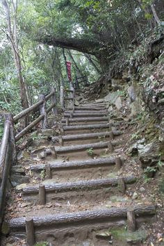 some stairs going up to the top of a hill