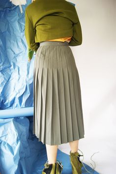 Elegant 1940's Pleated Midi Skirt Measurements: waist-26'', hips-48'', length-31'' Fits sizes S (US), please check the measurements above and our size chart Perfect Condition Vintage from the late 1940's 100% wool Each of the item in our store has been restructured, remade and redesigned. Each clothing is truly unique because it is vintage and new design at the same time. We inspect each item for the flaws, spots and signs of aging and select the best items that could become a material for our n Vintage Pleated Skirt Outfit, Vintage Long Skirt With Relaxed Fit, Fitted Accordion Pleats Daywear Skirt, Retro Fitted Skirt, Retro Fitted Skirt Bottoms, Fitted Accordion Pleated Skirt For Daywear, Fitted Accordion Pleats Pleated Skirt For Daywear, Fitted Long Skirt With Box Pleat, Classic Green Pleated Skirt