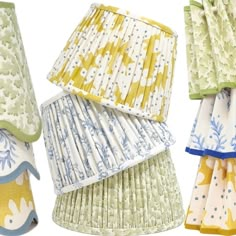 three different types of lampshades and one is yellow, white, and blue