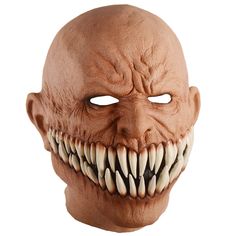 an adult mask with teeth and fangs on it