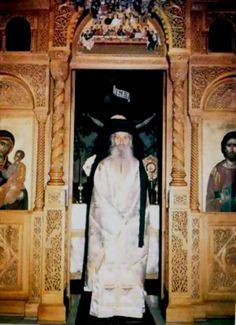 an old photo of a priest standing in front of the alter with other images behind him