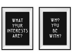 two framed black and white posters with the words, what your interests are?