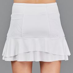 Active Lifestyle ApparelDesigned and made in USA. DESCRIPTION Two Tier Skort - Banded waistband, back pockets, great fit! DETAILS & FIT Fitted around hips, flared ruffles. Length: 15” inches all sizes, from waist to hem. FABRIC & CARE Self: 80% Polyester / 20% Spandex Machine wash cold, do not bleach, tumble dry low, cool iron, do not dry clean, do not hand wash Long Skort, Skirt Tennis, Womens Golf Skirts, Tennis Apparel, Tennis Skirts, Golf Apparel, Golf Skirts, Fit Details, Womens Tennis