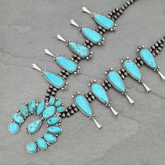 NWT  Full Natural Squash Blossom Turquoise Necklace  *New With Tag * Natural stones may vary in size, color, or shape * 33" long necklace & 3 toggle * 6mm & 8mm pewter western style pearl necklace * 4" long squash blossom natural stone pendant * 260 grams weight * Antique silver plate made of alloy * Nickel & lead free Please note *This is  custom  fashion jewelry*  Feel free to contact  me with any questions. Please no ugly COMMENTS.  I am sure we can work it out. . THANK YOU ALWAYS, Ann Happy Western Blue Lariat Jewelry, Blue Western Lariat Jewelry, Blue Lariat Western Style Jewelry, Nickel-free Turquoise Western Jewelry, Western Style Nickel Free Turquoise Jewelry, Western Blue Jewelry For Western-themed Events, Western Style Nickel-free Turquoise Necklace, Turquoise Necklace For Western-themed Events, Style Pearl Necklace