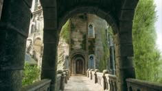 an archway leading into a castle like building