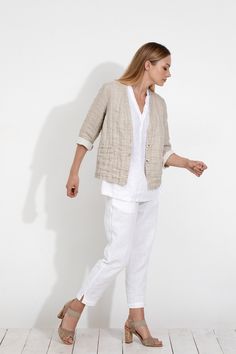 "IMPORTANT! Please, pay attention to shipping options below the „Easy care\" part. ★ DESCRIPTION Simple and effortless kimono jacket cut out of pure double-sided linen: natural on the outside, off-white on the inside. This is one of our finest and beloved fabrics for its subtle curliness and a beautiful texture. - Easy, boxy fit - Natural on the outside, off-white on the inside - Buttons at the front placket - Patched pockets - Bracelet sleeves Model featured is 5'7\" / 171cm. 100% natural linen Casual Linen Blazer For Daywear, Casual Beige Linen Cardigan, White Linen Outerwear, Beige Linen Casual Cardigan, White Linen Outerwear With Pockets, White Linen Outerwear For Fall, Linen Outerwear With Pockets For Daywear, Spring Neutral Cardigan With Pockets, Spring Linen Cardigan With Pockets