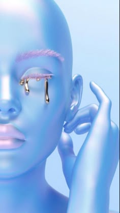 a woman with blue skin and piercings on her nose is holding her hand up to her ear