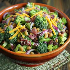 a bowl filled with broccoli and other vegetables