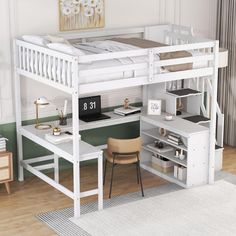 a white loft bed with desk underneath it