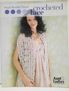 an advertisement for crocheted lace featuring a woman in a pink dress and white shawl