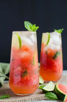 two glasses filled with watermelon mojito