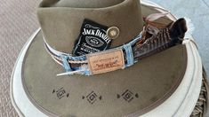 Brixton burnt felt hat size large with cow skull, Levi  hat band with feather Burnt Felt Hat, Band Inspiration, Boho Hats, Jack Daniels No 7, Custom Cowboy Hats, Hat Bar, Beaded Hat Bands, Wyoming Cowboys, Hat Bands