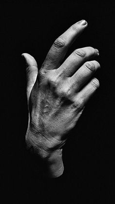 black and white photograph of an outstretched hand