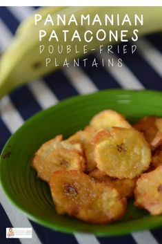 a green plate topped with sliced bananas on top of a table