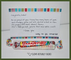 a candy bar is next to a note that says congratulations