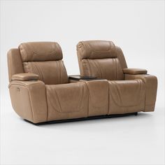 two reclining chairs sitting next to each other