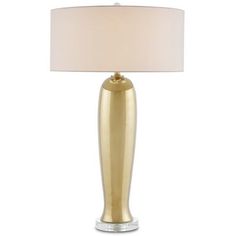 a gold lamp with a white shade on it