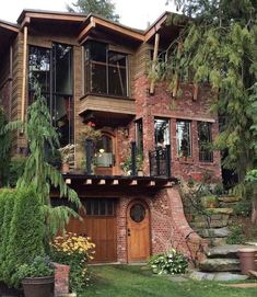 a large brick house with lots of windows