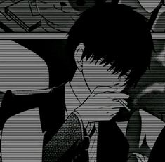 an anime character with his hand on his face in front of him and the background is black and white