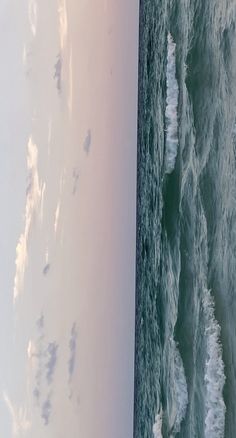 an aerial view of the ocean and sky