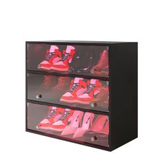 three drawers with different colored shoes on them