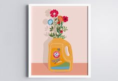 a yellow jug with flowers in it sitting on a pink surface next to a white frame