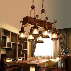 a chandelier hanging over a dining room table