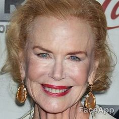 an older woman with blonde hair and blue eyes smiles at the camera while wearing gold earrings