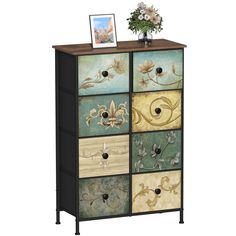 a multicolored cabinet with flowers on top