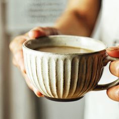 Treat yourself with a classic color pairing that's as timeless as your morning cup of joe. The creamy hue gracefully complements the pristine white mug, creating a harmonious balance that's both calming and delightful. The mesmerizing vertically ribbed pattern adorning the sides of the cup adds a touch of intrigue, creating a visual treat that's bound to charm. But that's not all – pair the cup with its matching saucer, and watch as the pattern's elegance takes on a unique twist. The pattern gra Cerámica Ideas, Breakfast Cups, Coffee Dessert, Pottery Classes, Pottery Cups, Ceramics Ideas Pottery, Handcrafted Ceramics, Mug Set, Breakfast Dessert