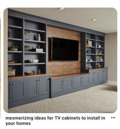 an entertainment center with built - in cabinets and a flat screen tv on the wall