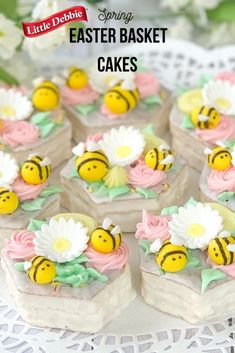 some little cakes with flowers and bees on them