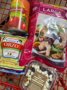 some food is sitting on top of a shopping cart in the store and it's packed