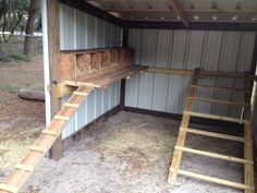 the inside of a shed with stairs leading up to it