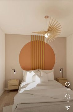 a bed with white sheets and pillows in a room that has an orange circle on the headboard