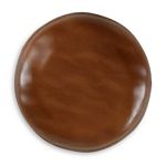 a round wooden button on a white background