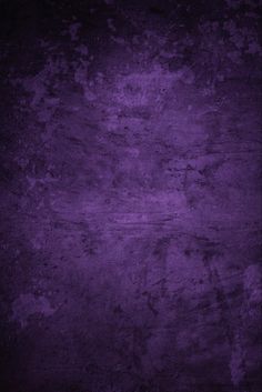 a dark purple background with some stains on it