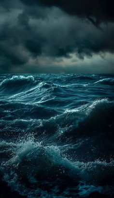 the ocean is very dark and stormy at night