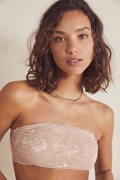 Lovely in lace, this sweet bandeau bra is featured in a tube-style silhouette with scalloped lace trim, lightly lined bust and pull-on design for ease. | Cosabella Flirtie Bandeau Bra at Free People in Tan, Size: XS Elegant Lace Bandeau Bra, Fitted Strapless Bra With Lace Trim, Summer Bandeau Lace Bra, Elegant Bra With Lace Bodice, Strapless Lace Trim Tube Top, Bra Friendly Lace Strapless Tube Top, Lace Strapless Tube Top Bra Friendly, Lace Bra-friendly Strapless Tube Top, Lace Strapless Bra-friendly Tube Top