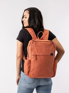 Need a backpack that's both sustainable and practical for college, school everyday use or outdoor activities? Our Earth Backpack is perfect for you. Our spacious and durable Earth Backpack is the workhorse of our line, built for everyday carry with heavy-duty certified organic cotton canvas. The generous main compartment is divided with a no-fuss sleeve for your laptop and one small interior pocket to keep things organized. Two water bottle sleeves and the large zippered exterior pocket keep hyd Practical Everyday Backpack With Adjustable Straps, Everyday Standard Backpack For Back To School, Back To School Backpack For Everyday, Everyday Backpack With Zipper Pocket For Back To School, Everyday Rectangular Backpack With Functional Pockets, Versatile Backpack For Daily Use And Back To School, Softback Backpack For Commuting And Back To School, Versatile Canvas Backpack For School, Practical Everyday Backpack